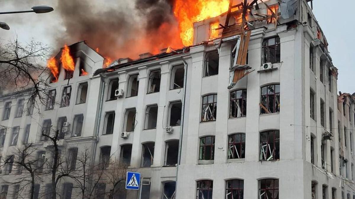 A security service building burns after shelling in Kharkiv, Ukraine.