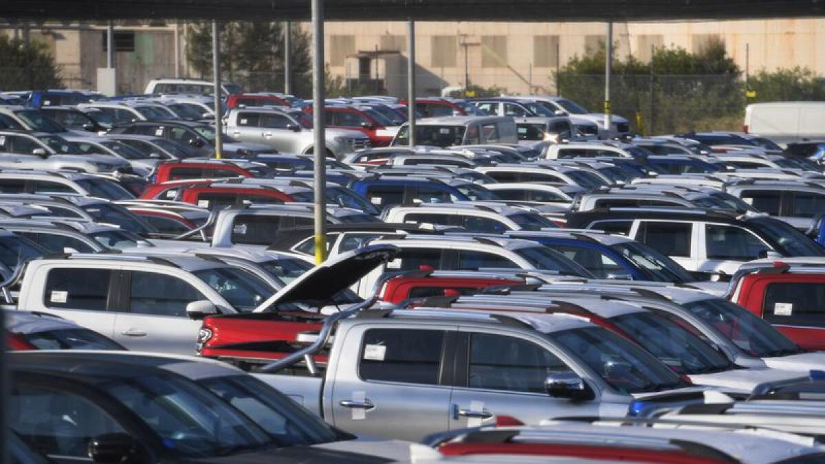 Thousands of new cars await delivery