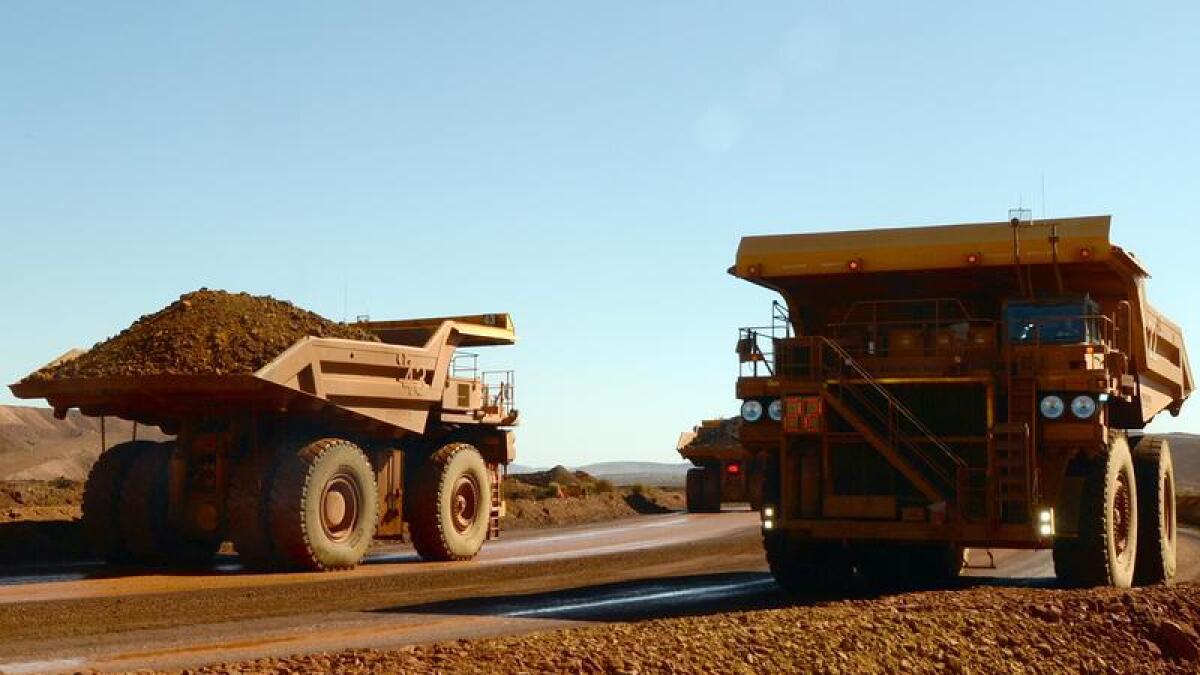 Haulage trucks at a mine site.