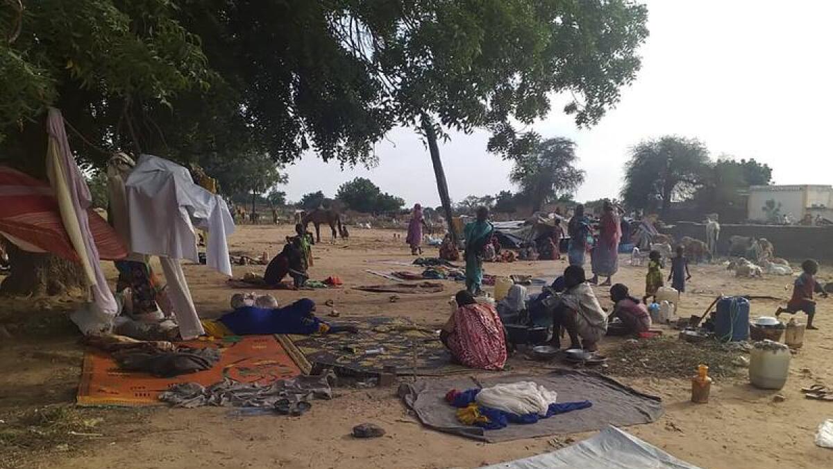 Residents displaced from a surge of violence in Darfur