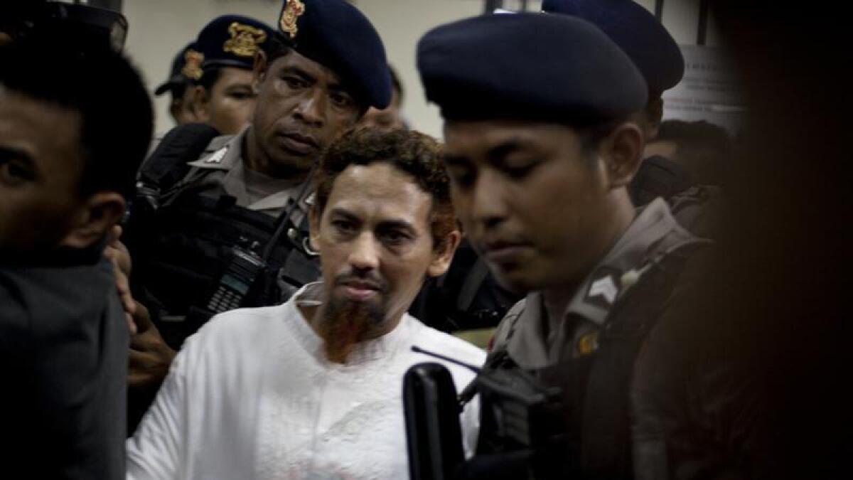 Umar Patek (c) was sentenced to 20 years over the Bali bombings.