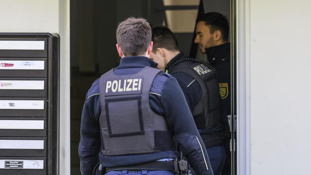 Police arrest a man in Germany