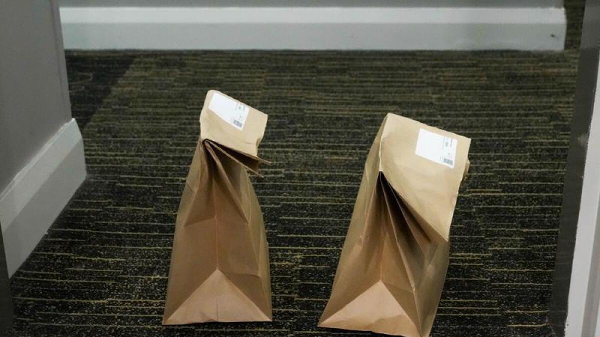 Meals delivered to a hotel room during isolation