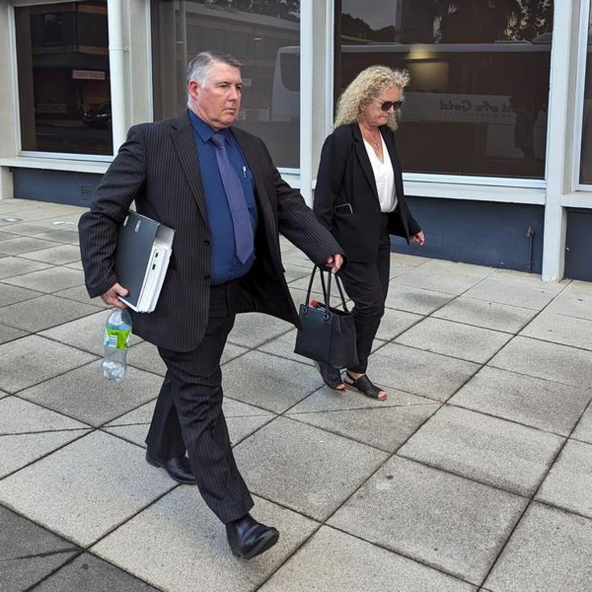 Glen Coleman (L) leaves Penrith District Court (file image)