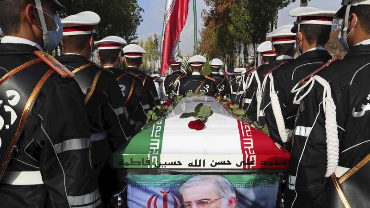 Soldiers carry the coffin of nuclear scientist Mohsen Fakhrizadeh.