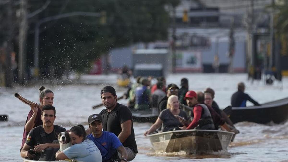 Residents evacuated from areas flooded by heavy rains in Porto Alegre
